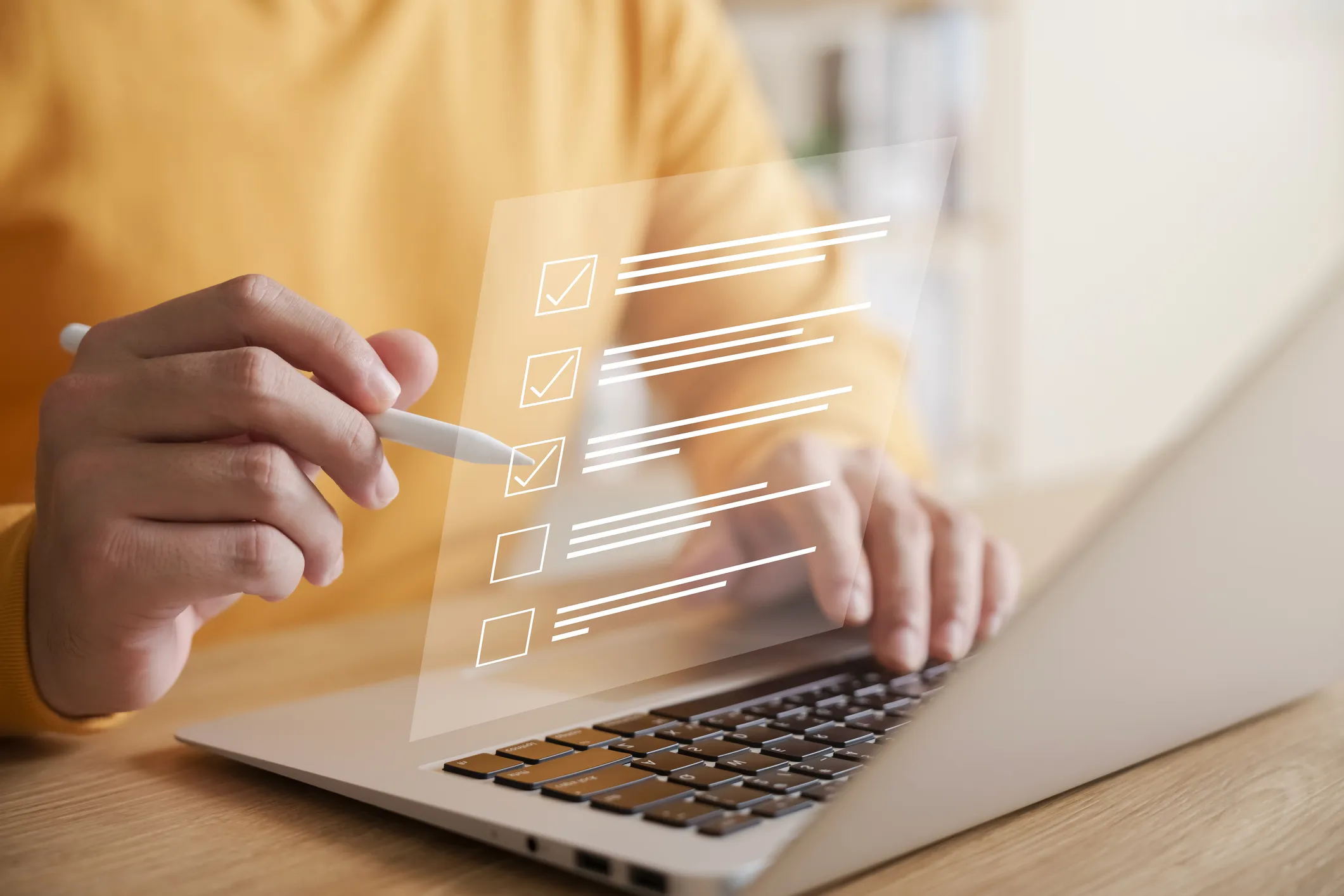 Person using a stylus to mark items on a digital checklist
