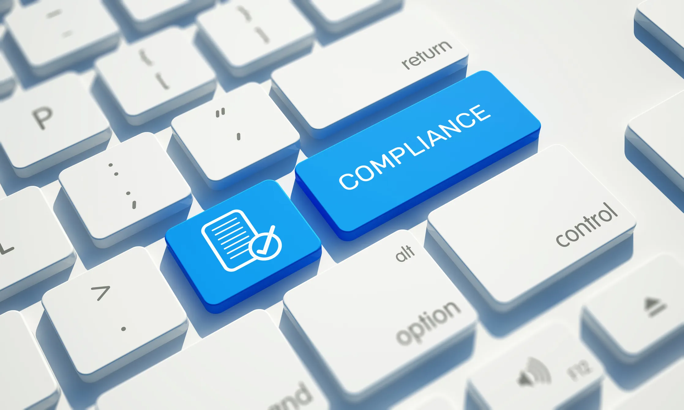 A clean, white computer keyboard features a prominent blue key labelled "Compliance," accompanied by a document verification icon.